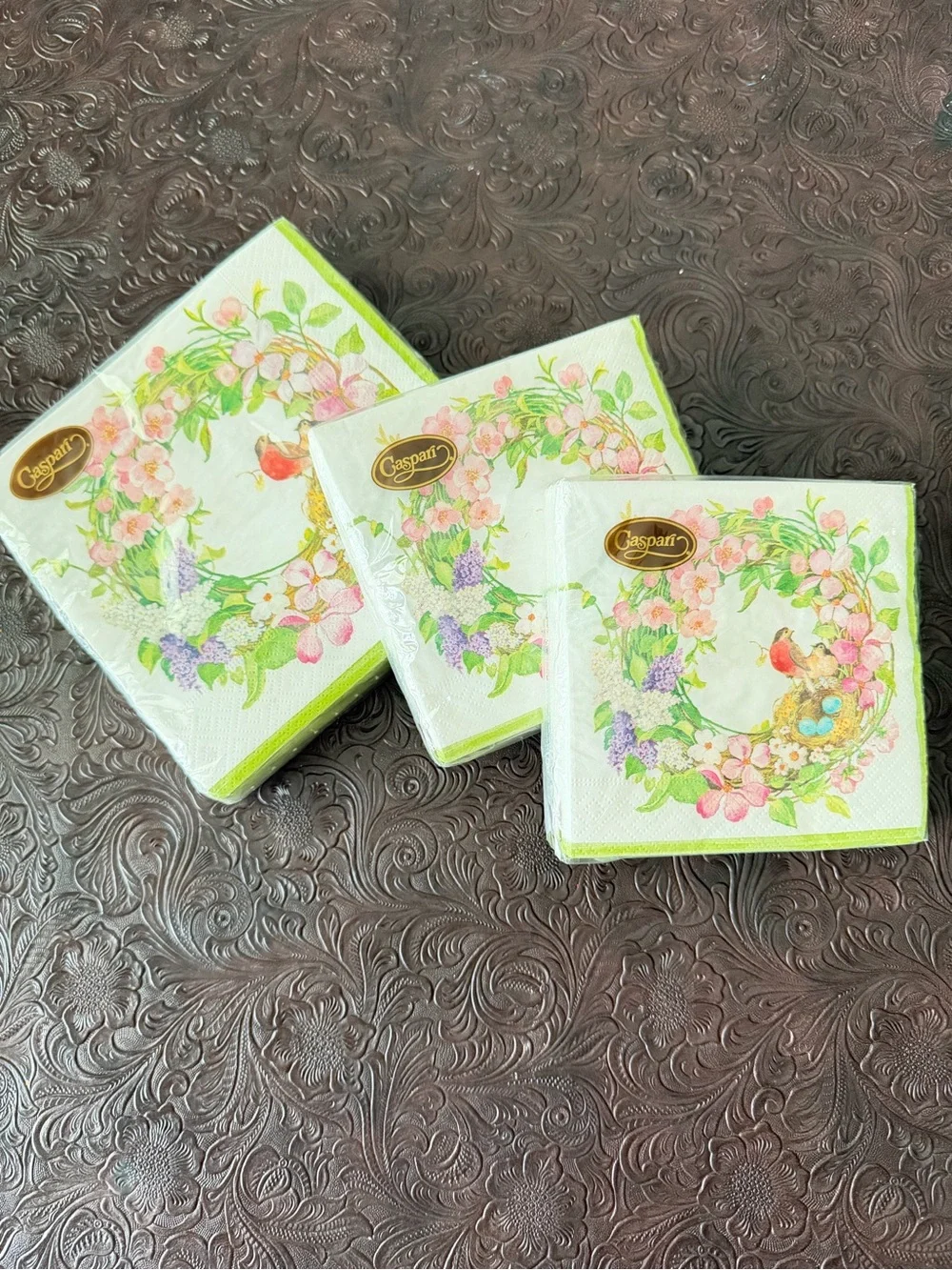 Three packages of Caspari napkins. 1 lunch 2 cocktail Floral Bird Paper Napkins